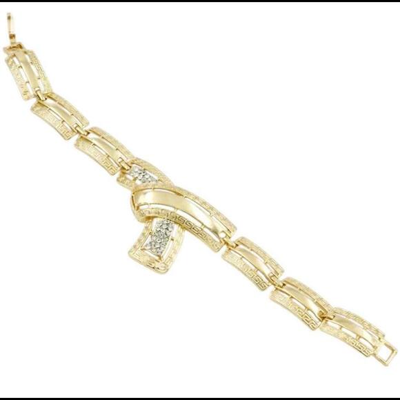 Gold Tone and Clear Stones Necklace, Bracelet, Earrings, and Adjustable Ring Set - Picture 8 of 9